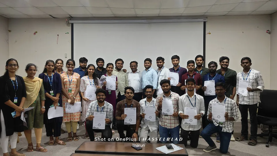 Students posing with their certificates alongside the campus placement team